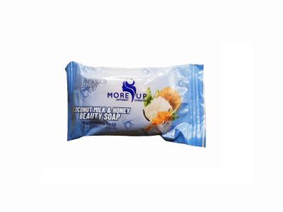Moreup coconut milk beauty soap bar, blue and white wrapper with honey and coconut accents
