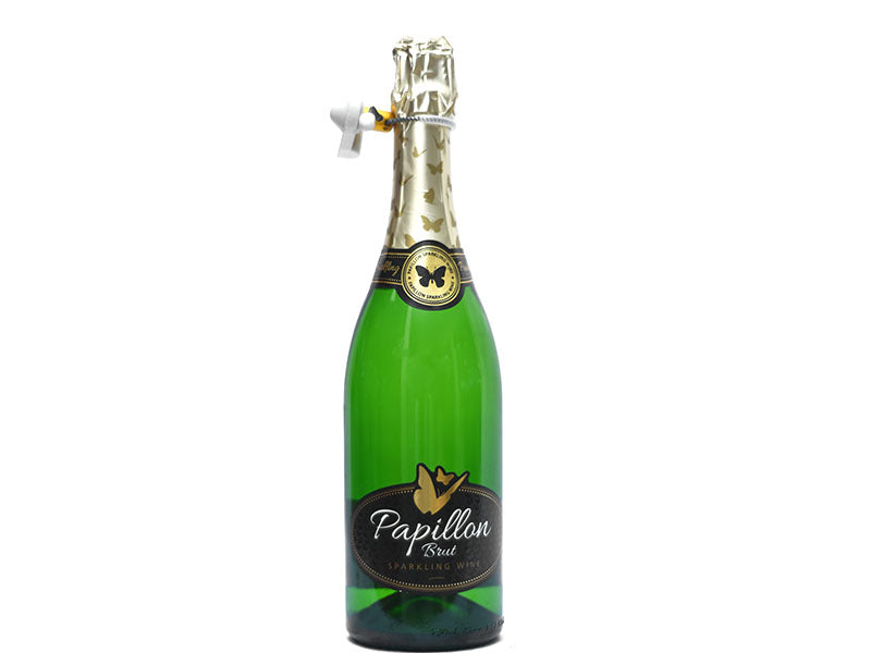 Green glass sparkling brut wine bottle with gold foil cap and brand label