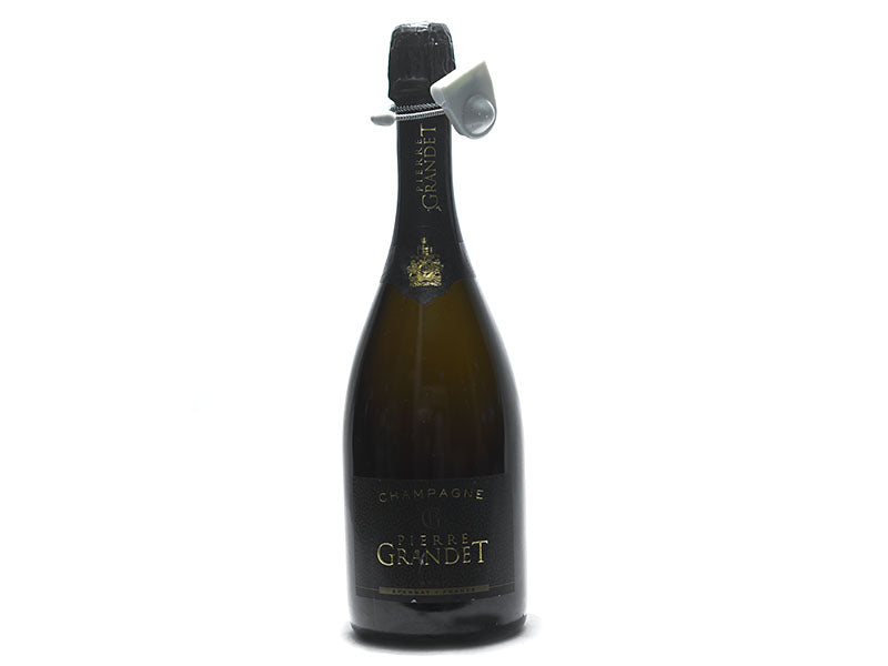 Brut champagne bottle in dark glass with black capsule and gold crest front label