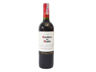 Casillero del Diablo wine bottle, dark glass with red foil cap