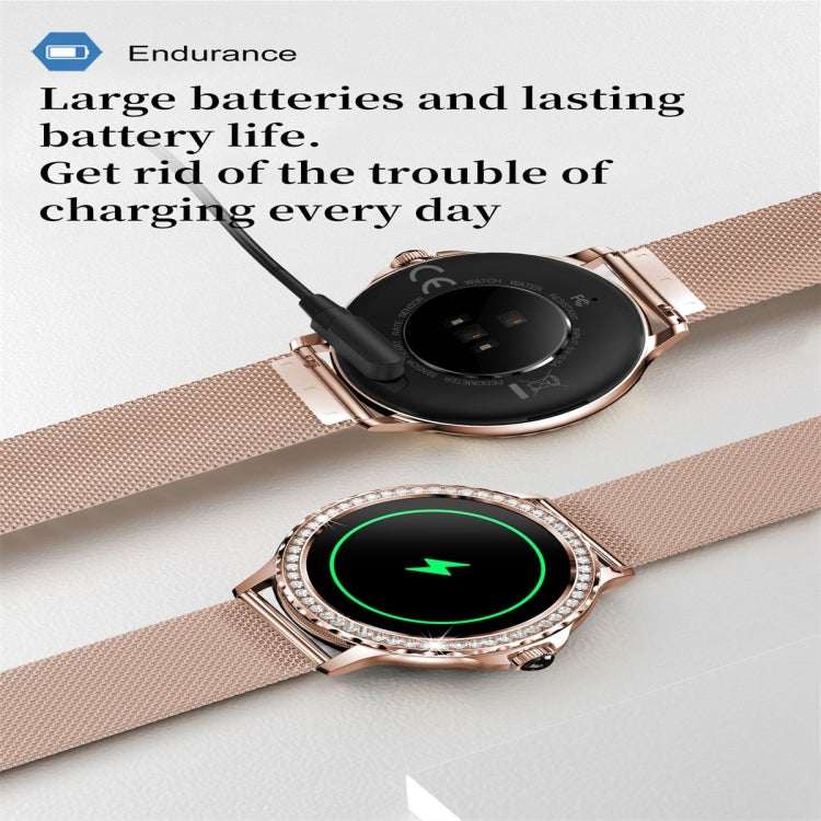 NX19 round smart watch with black display and green ring, jeweled bezel, silver mesh band
