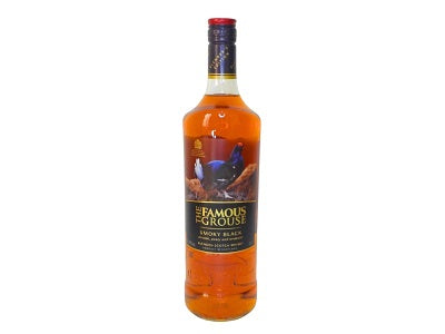 Amber whisky bottle with red cap, label for The Famous Grouse Smoky Black