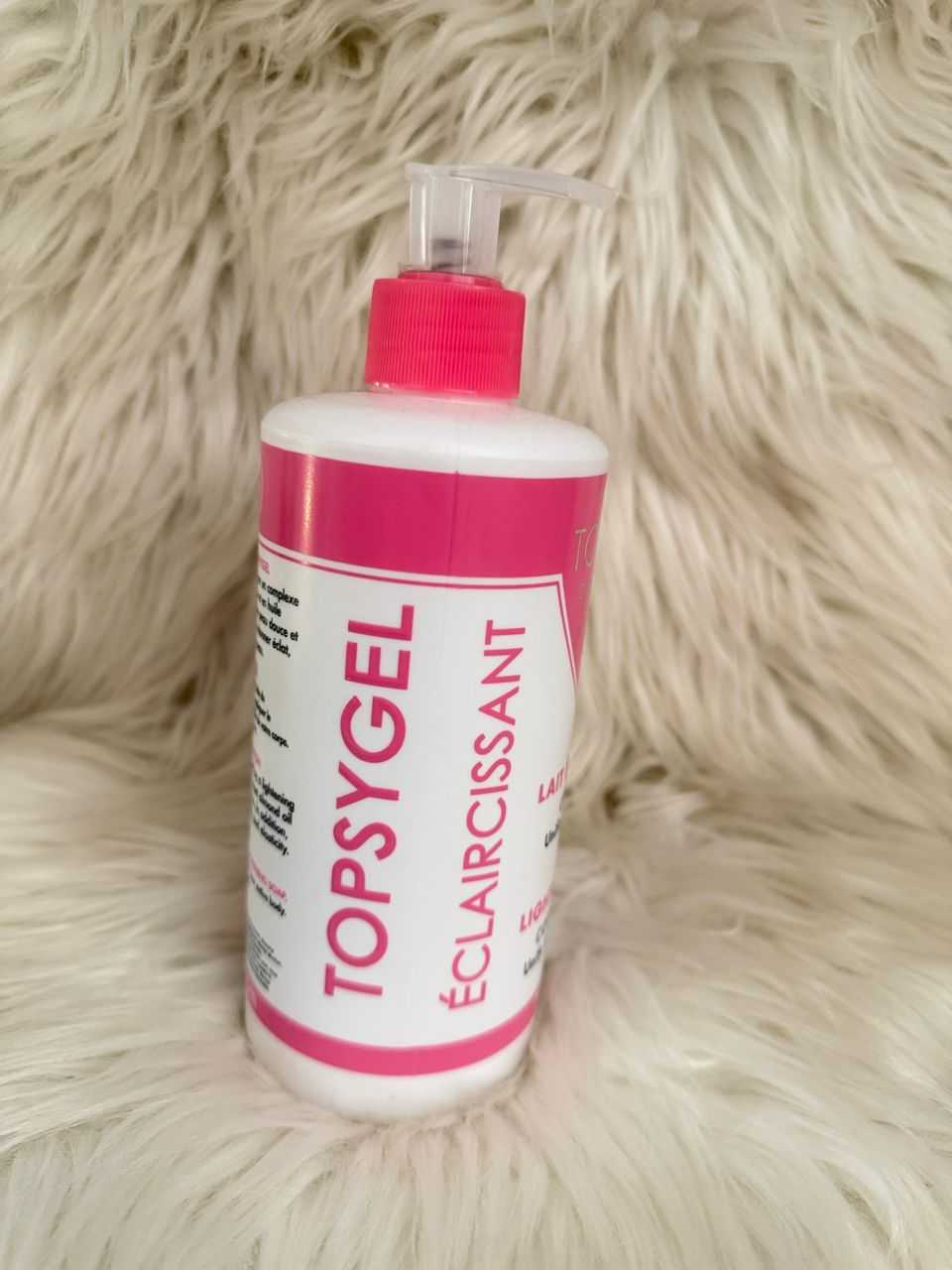 TOPSYGEL brightening cleanser bottle with pink cap and pump, white and magenta label