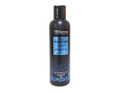 Tresemme shampoo bottle with black cap and blue Moisture label