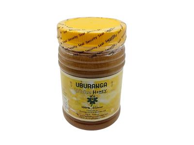 Uburanga 1000g honey jar with golden honey and yellow screw-top lid