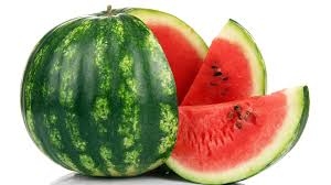 Watermelon with green rind and red slices, showing seeds and juicy interior