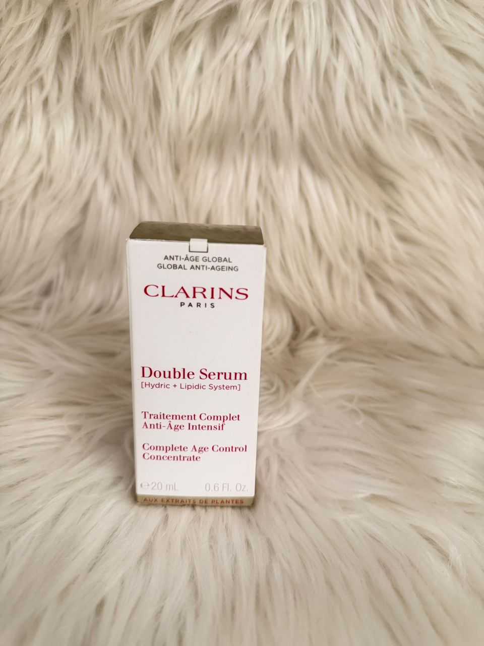 Clarins Double Serum anti-aging treatment box, white with brown cap