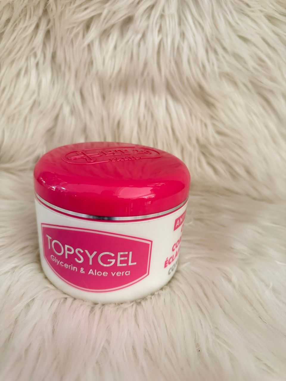 TOPSYGEL cream jar with pink lid and white label, front label visible