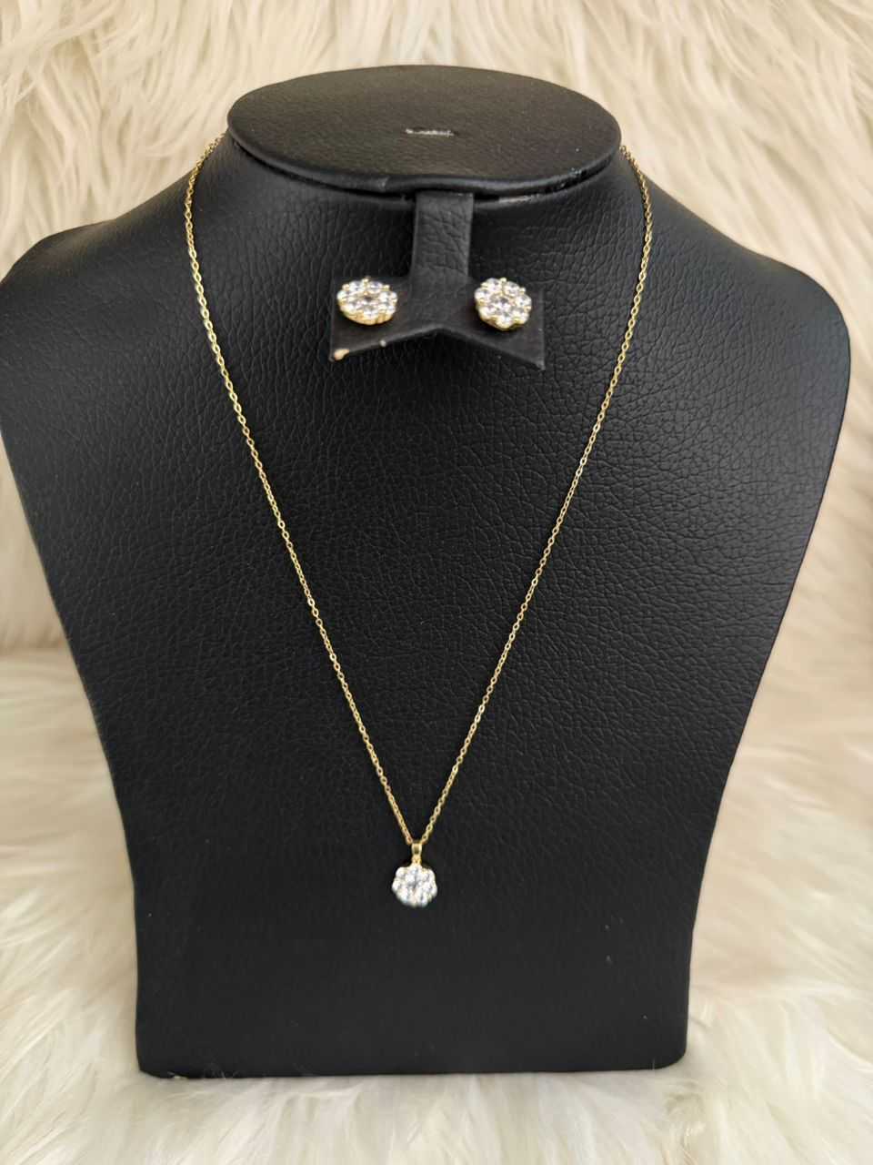 Gold-tone diamond-style jewelry set with round rhinestone pendant and stud earrings