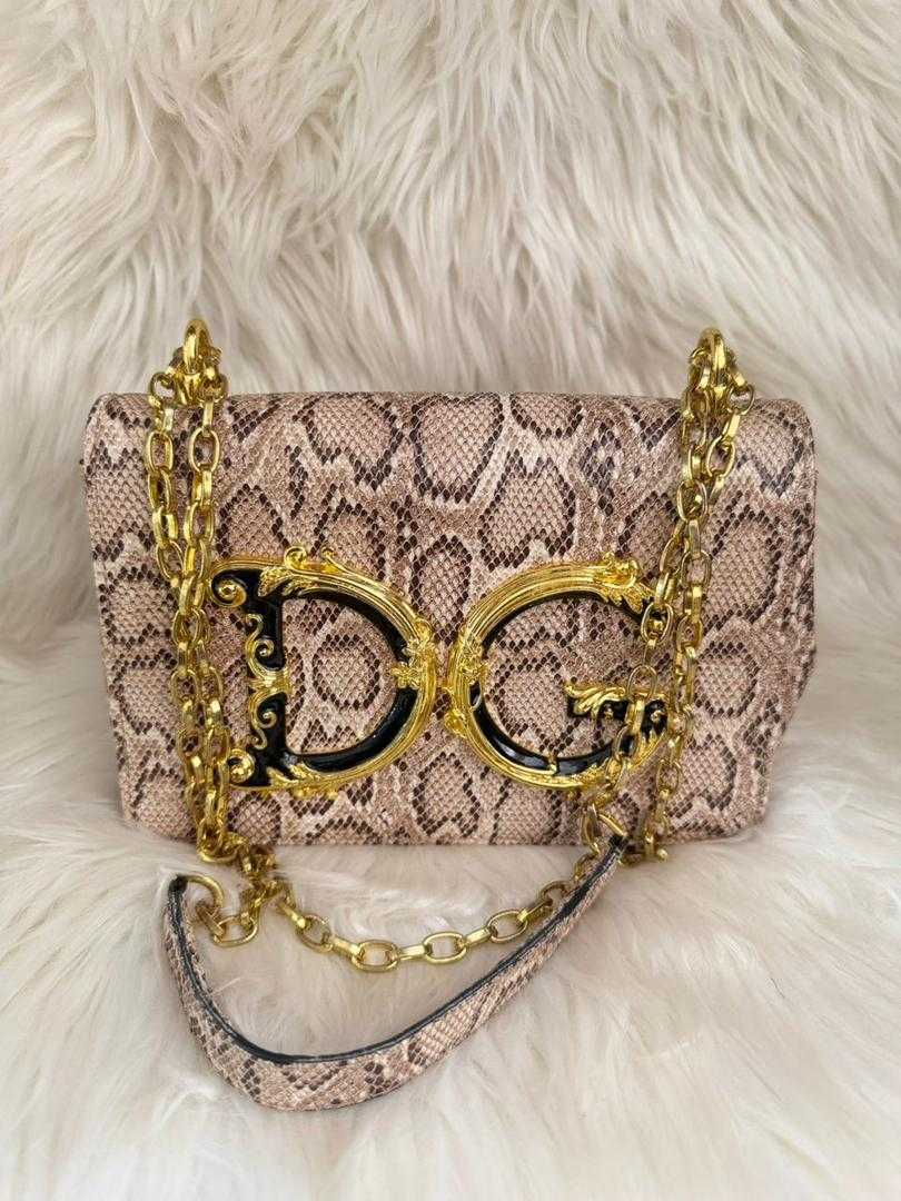Snake-print flap handbag with gold-tone chain shoulder strap and ornate buckle clasp