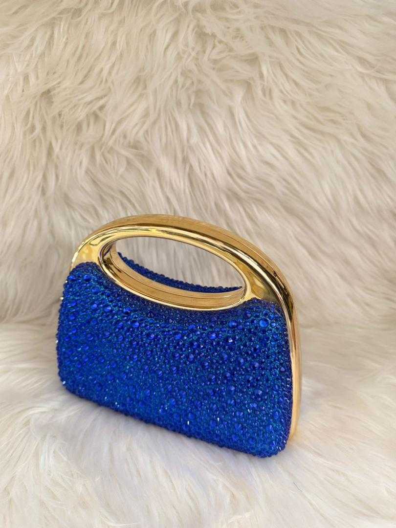 Blue crystal handbag with gold oval top handle