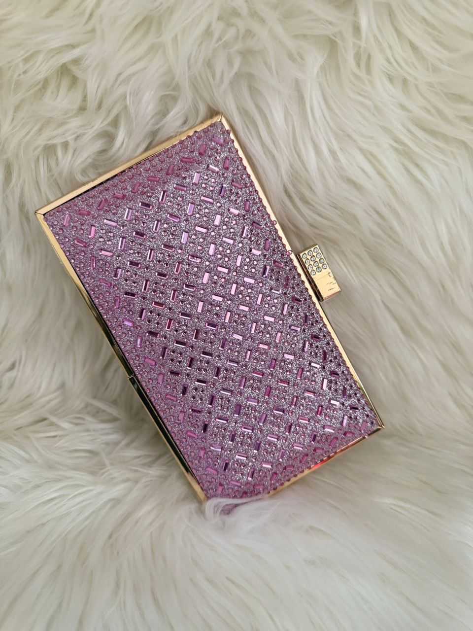 Pink-purple glitter clutch handbag with gold-tone frame and top clasp