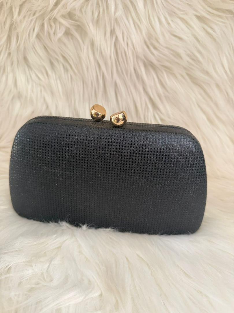 Dark textured clutch purse with gold kiss-lock clasp