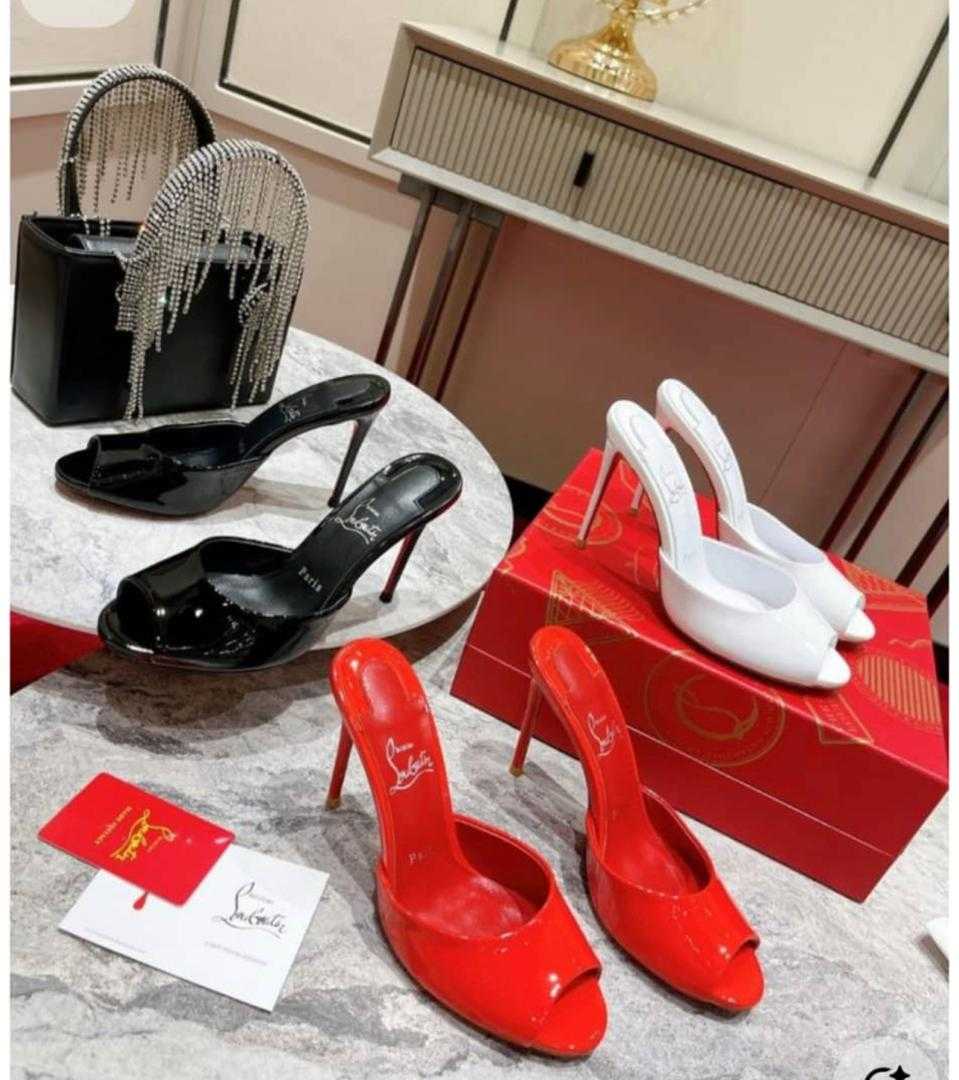Christian Louboutin red stiletto pumps and black heeled mules, pointed toe