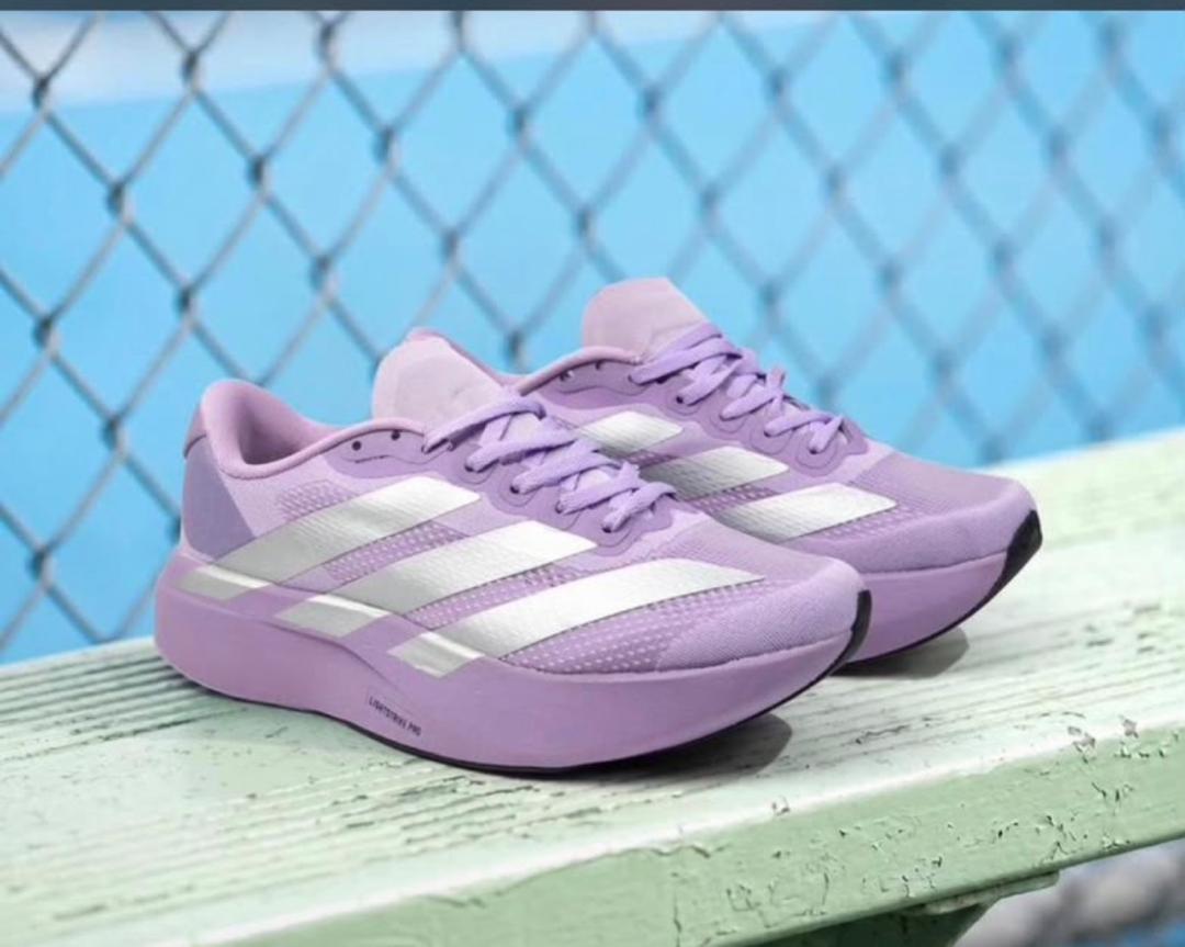 Lavender lace-up Adidas Adizero EVO SL running shoes with white 3-Stripes.