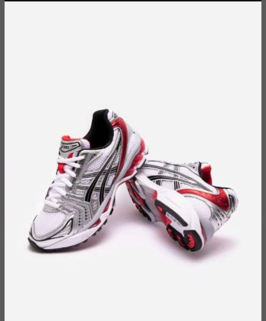 ASICS GEL-KAYANO 14 running sneakers in light gray with black and red accents