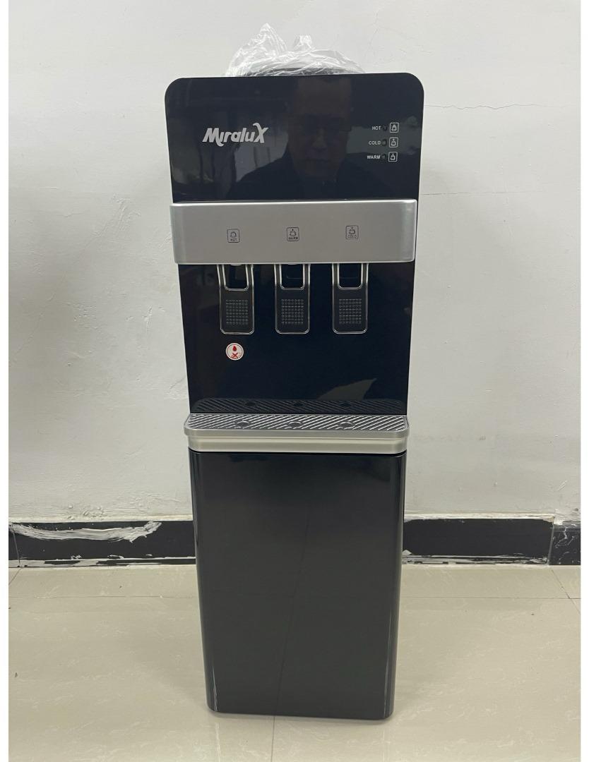 Miralux water dispenser, front view with three dispensing nozzles and lower water tank