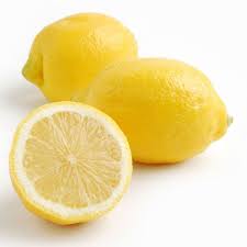 Fresh yellow lemons, 1 kg; two whole lemons and one halved lemon