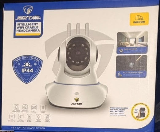 White indoor WiFi cradle head camera with dome lens on charging base