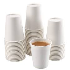 Disposable white paper cups, ridged design, multiple stacked with filled cup