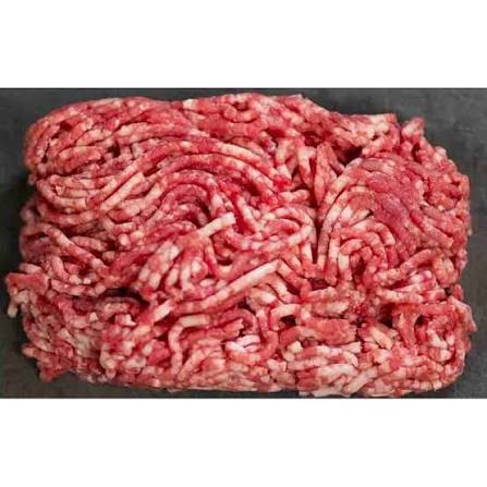 Raw minced meat with fats in a compact pink-red bundle