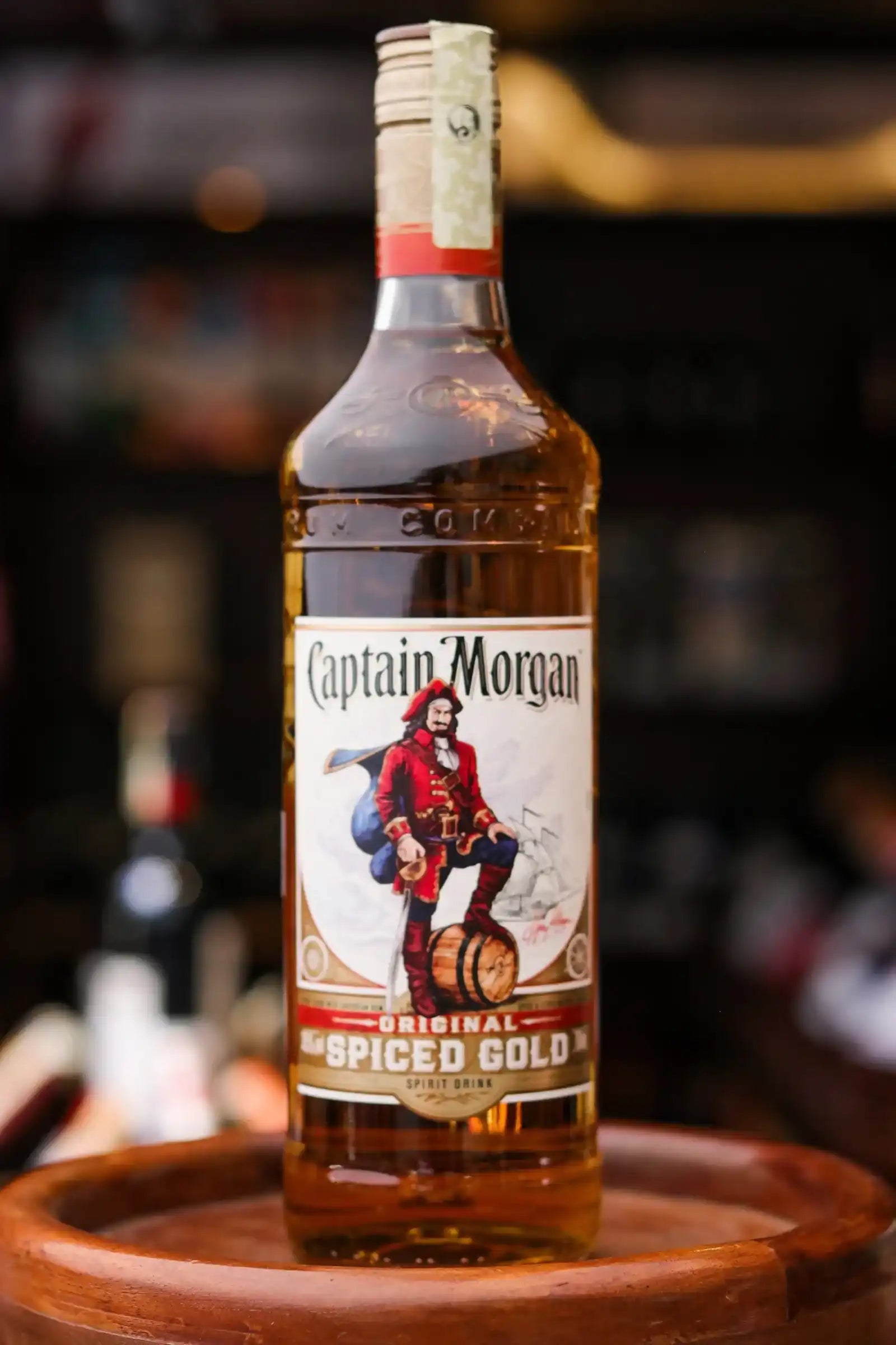 Captain Morgan spiced gold rum bottle with red label and gold foil