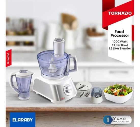 Food processor with clear bowl, blender cup, and small accessory attachments on counter