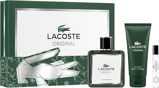 Perfume gift set with glass bottle, green tube, and boxed packaging